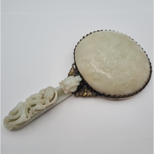 237 - A Hand Mirror formed from a carved Chinese Jade Buckle and carved Chinese Jade shallow Bowl with sil... 