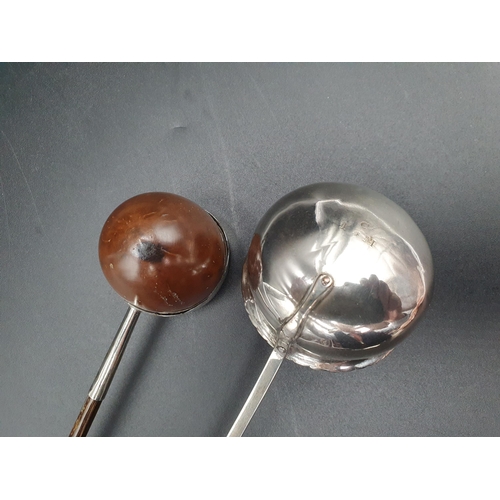 29 - Two antique Toddy Ladles, one with coccus bowl, the other silver, both with spiral whalebone handles