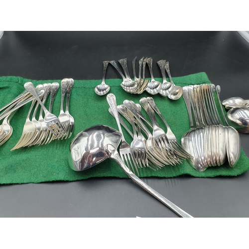 32 - A Victorian silver Set of Cutlery for twelve, old english pattern with bright cut decoration engrave... 