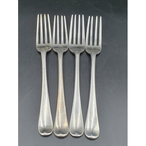 40 - Four George III silver Dinner Forks old english pattern engraved crests, London 1806, maker: Eley & ... 