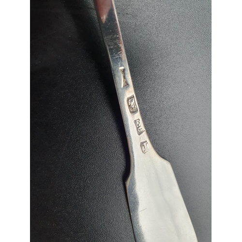 45 - A George IV Irish silver Sauce Ladle fiddle pattern with pouring lip and engraved initial F, Dublin ... 