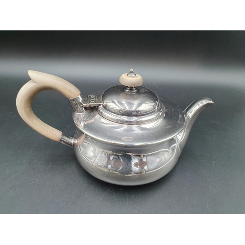 47 - A George V silver Teapot of compressed circular form, Birmingham 1922, maker: Adie Bros, 440gms