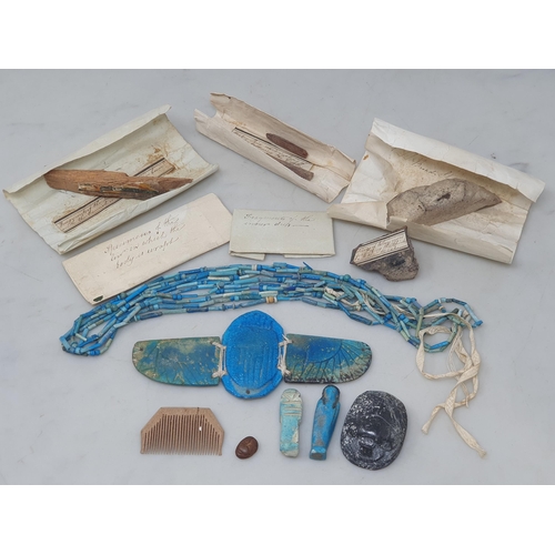 683 - A small group of Ancient Egyptian artefacts, to include a Faience winged Scarab (approx 14cm across)... 