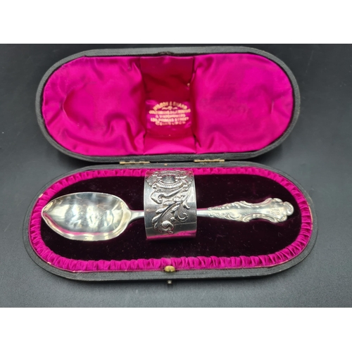 72 - An Edward VII silver Christening Spoon and  Napkin Ring with leafage scroll embossing and initials, ... 