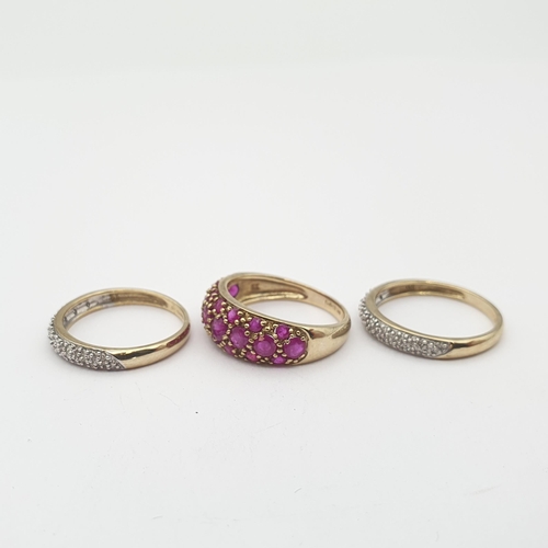 167 - A bombé Ruby Ring peg-set round stones in 9ct gold, ring size K 1/2 and two Diamond Rings in the sam... 