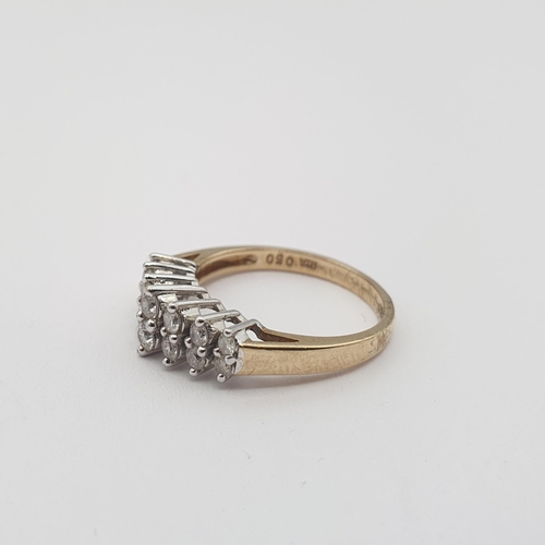 180 - A Diamond Ring claw-set two rows of graduated brilliant-cut stones in 9ct gold, ring size K 1/2. app... 