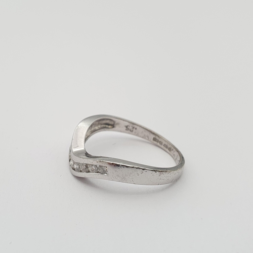 181 - A Diamond wishbone Ring channel-set brilliant-cut stones in 9ct white gold, ring size L - L 1/2, app... 