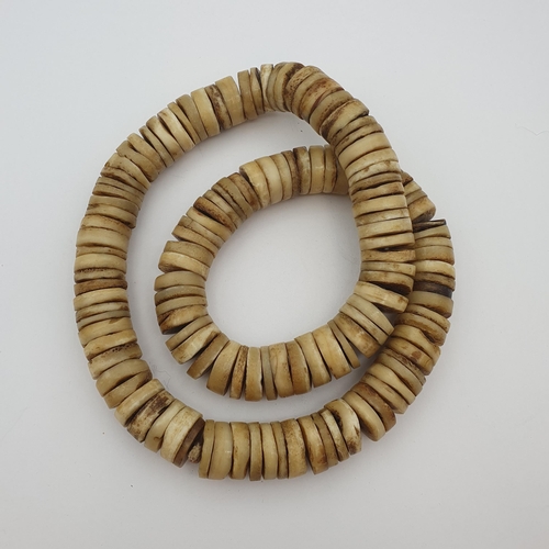 185 - A heavy Bone disc Necklace, purchased from Liberty's and an Indian silver collar Necklace