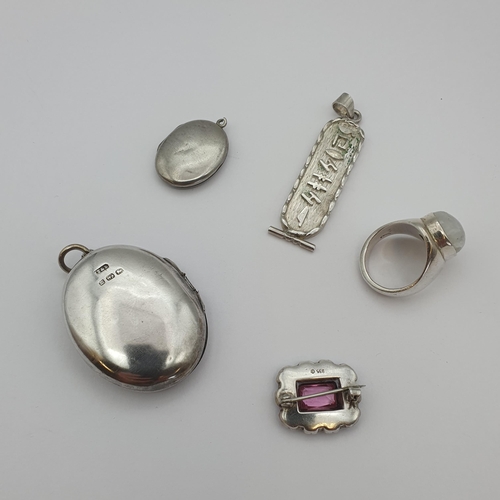 190 - Two oval silver Lockets, an Egyptian Pendant, a Ring stamped 925 set moonstone and a paste set Brooc... 