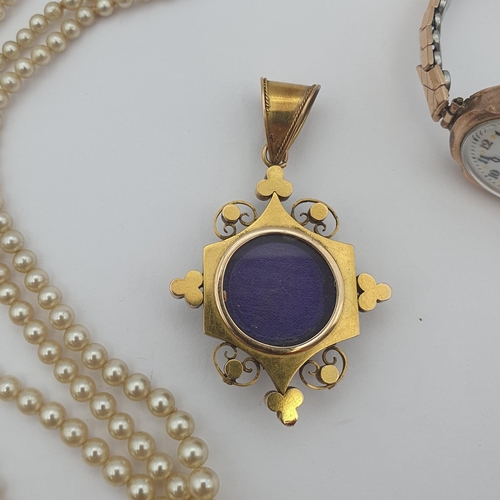 196 - A Victorian micro mosaic Pendant depicting posy of violets in an intricate gold frame, lacks tessera... 