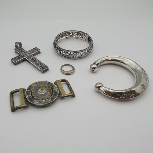 205 - A silver bombé Ring, filigree Cross and hinged Bangle, a white metal Bangle and a Grenadier Guards B... 