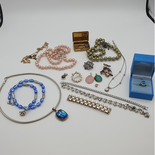 211 - A collection of Costume Jewellery including; simulated pearls, diamanté Bracelet, Dress Ring set blu... 