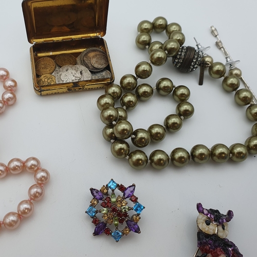 211 - A collection of Costume Jewellery including; simulated pearls, diamanté Bracelet, Dress Ring set blu... 