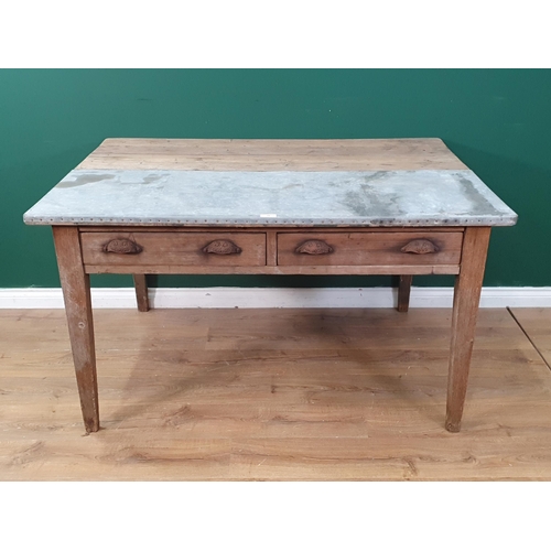 39 - A pine Table with half zinc top, with pair of fitted drawers and raised on square tapered supports, ... 