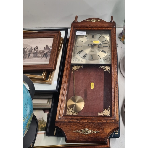 390 - A Wall Clock, an electric Globe, Passed PAT and a group of Framed Prints, etc. (R5).