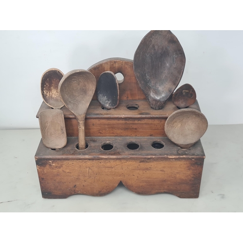 40 - An antique pine Spoon Rack 12in W x 10in H with seven wooden Spoons (R3)
