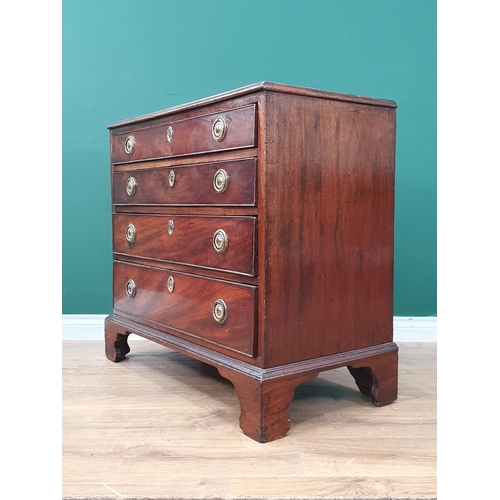42 - A 19th Century mahogany Chest of four long graduated drawers, with ring handles, and raised on brack... 