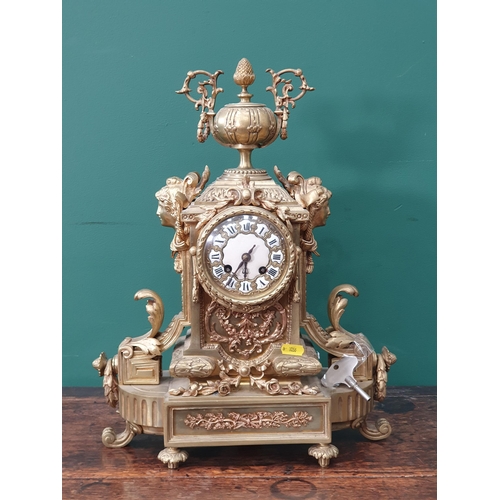 49 - An antique French gilded Mantle Clock with pineapple finial 1ft 6in H (R3)