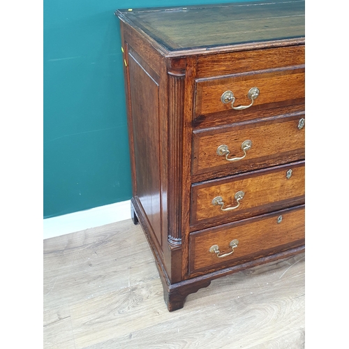 50 - An 18th Century oak and mahogany crossbanded Chest fitted four dummy drawers above four drawers rais... 