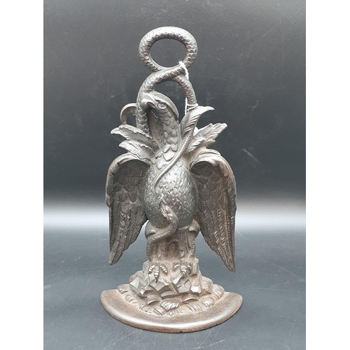 54 - A Victorian cast iron Door Stoop in the form of an eagle and serpent, 14in, Diamond registration mar... 