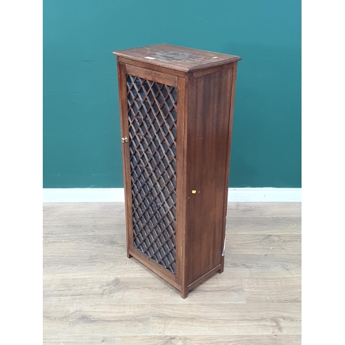 546 - A modern hardwood Cupboard/Music Cabinet with glazed and lattice work single door, A/F, 44