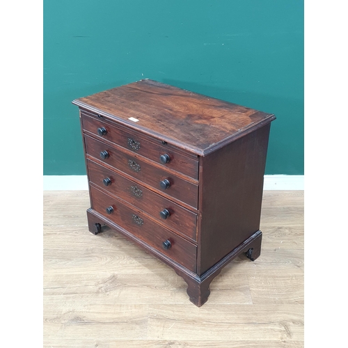 549 - A 19th Century Batchelors Chest with brush slide above four graduated drawers raised on bracket feet... 