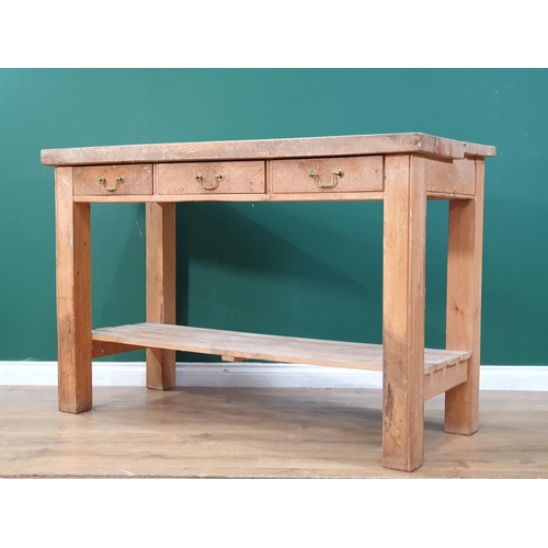 552 - A Kitchen Prep Table with thick two piece top, above three fitted drawers, on square supports and po... 