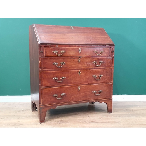 553 - A 19th Century mahogany and satinwood strung Bureau fitted four drawers raised on bracket feet 3ft 6... 