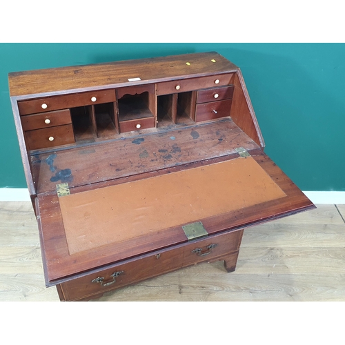 553 - A 19th Century mahogany and satinwood strung Bureau fitted four drawers raised on bracket feet 3ft 6... 