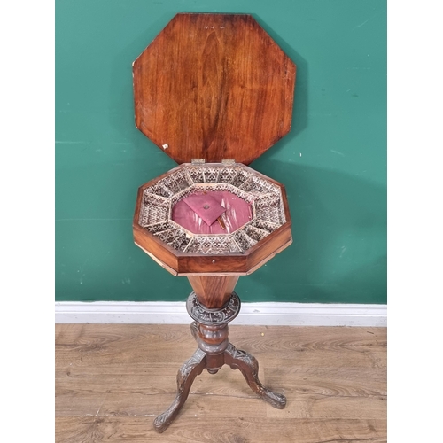 588 - A walnut trumpet Sewing/Games Table, the top with inlaid chequer board top, the interior with multip... 