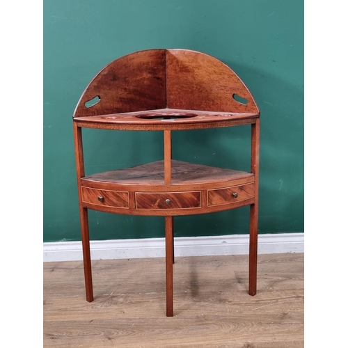 589 - A mahogany Corner Washstand with raised upstand, single fitted drawer flanked by pair of dummy drawe... 