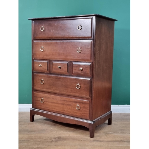 598 - A Stag Chest of three short and four long drawers 3ft 8in H x 2ft 8in W, an upholstered Stool with c... 