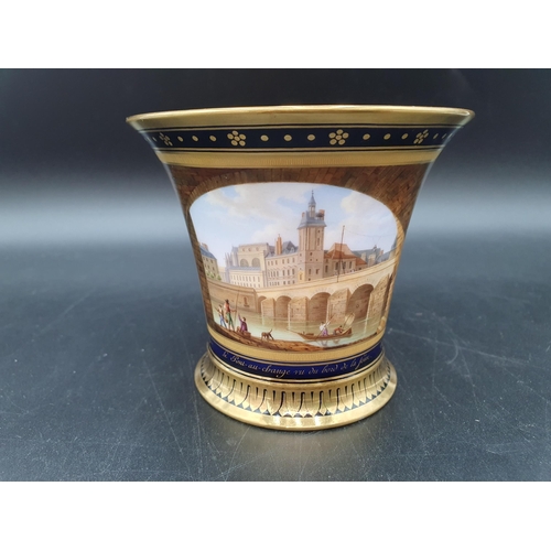 65 - A Sevres Cabinet Cup finely painted with reserve of 