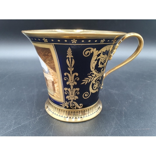 65 - A Sevres Cabinet Cup finely painted with reserve of 