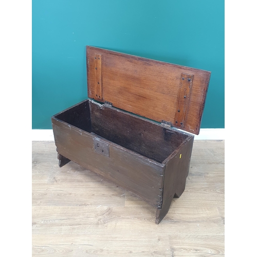 69 - A 17th Century oak plank Coffer with hinged and moulded top, 2ft 9in W, (R10)