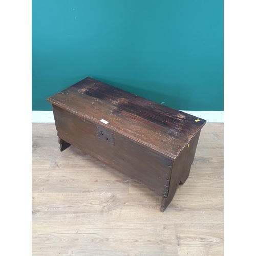 69 - A 17th Century oak plank Coffer with hinged and moulded top, 2ft 9in W, (R10)