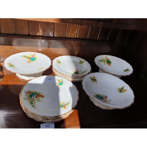 79 - A part Dessert Service, decorated sprays of flowers with gilt borders and a Crown Staffordshire part... 
