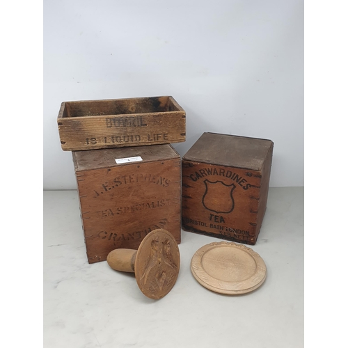 1 - Two vintage wooden Tea Boxes, a wooden 'Bovril' Box, a Butter Press and a treen Teapot Stand (R2)