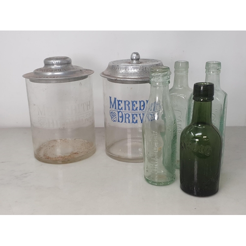 11 - Two Meredith & Drew Biscuits Barrels with metal lids 9 1/2in H, a Stroud Brewery Co. glass Bottle an... 