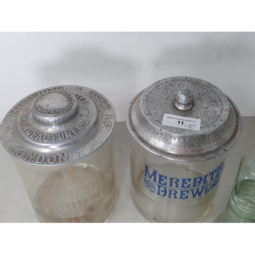 11 - Two Meredith & Drew Biscuits Barrels with metal lids 9 1/2in H, a Stroud Brewery Co. glass Bottle an... 