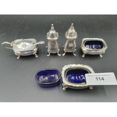 114 - A George V silver four piece Condiment Set, London 1916, and and a matching plated Salt
