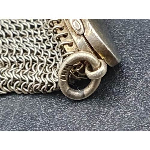 150 - A mesh Sovereign Purse with hinged lid engraved crest and attached loop, marked 9c, Rd No 539576