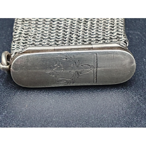 150 - A mesh Sovereign Purse with hinged lid engraved crest and attached loop, marked 9c, Rd No 539576