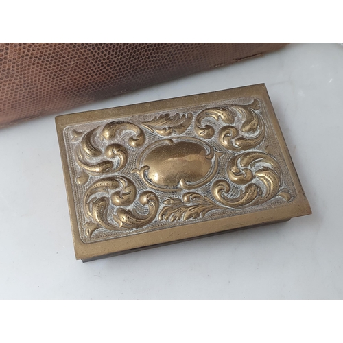 20 - An antique French oval brass Box with relief hunting scene stamped to underside 'A.B. Paris' 3in, an... 