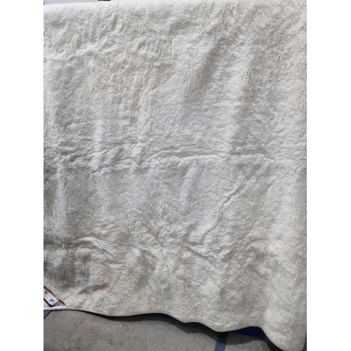 221 - A luxury Llama wool Blanket, 7ft 2in x 7ft 2in