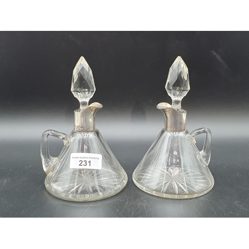 231 - A pair of George V silver mounted cut glass Toddy Flasks and Stoppers, Birmingham 1920