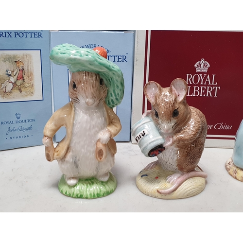 245 - A collection of Nine boxed Royal Albert Beatrix Potter Figures including, 