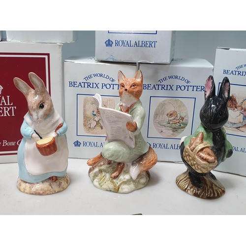 245 - A collection of Nine boxed Royal Albert Beatrix Potter Figures including, 