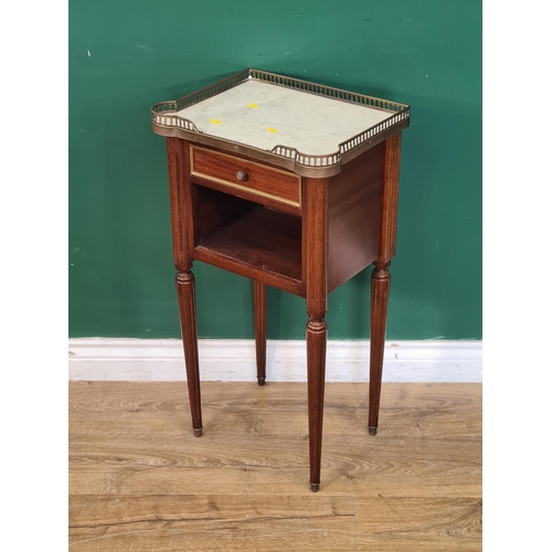 282 - A French style marble-topped Bedside Stand with pierced brass gallery on fluted tapering supports, 2... 