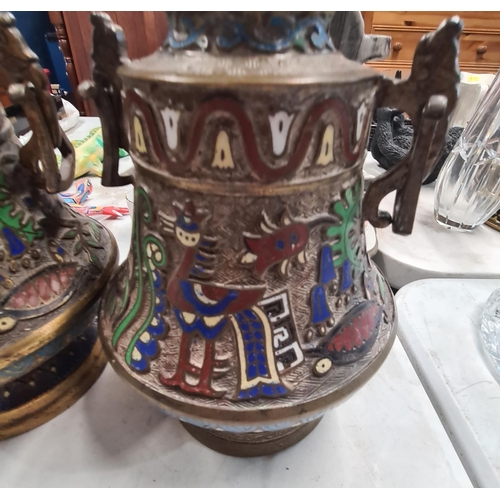 306 - A near pair of Eastern Champleve twin handled Vases, with birds and flower decorations, 9.5